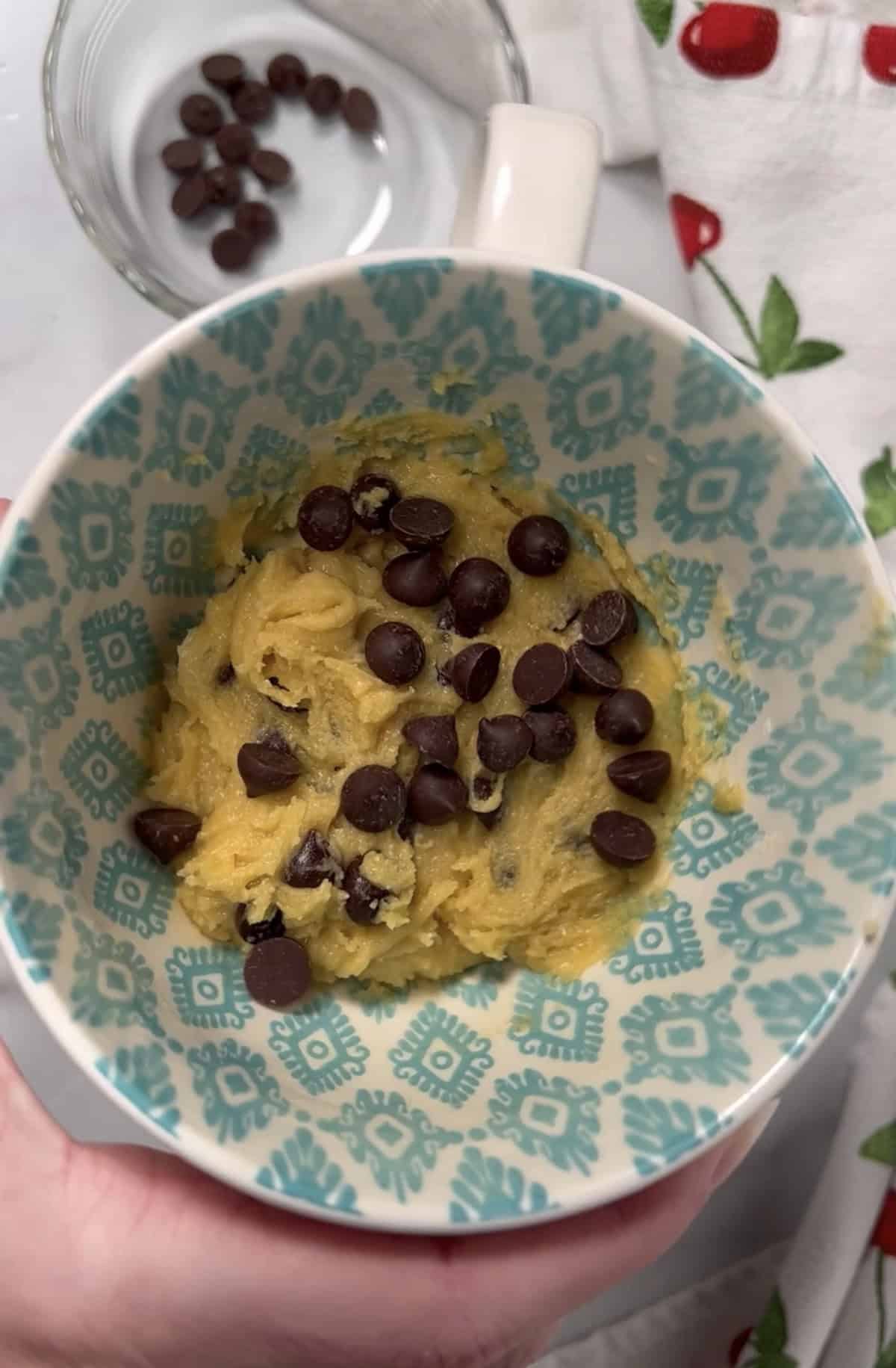 Cookie dough in coffee cup.