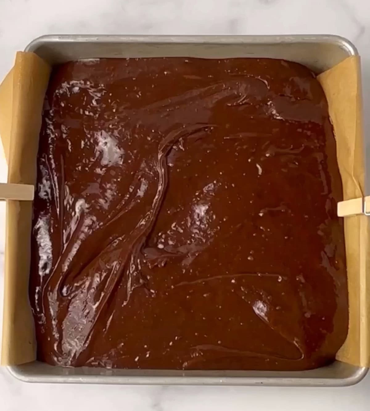 Brownie batter in pan.