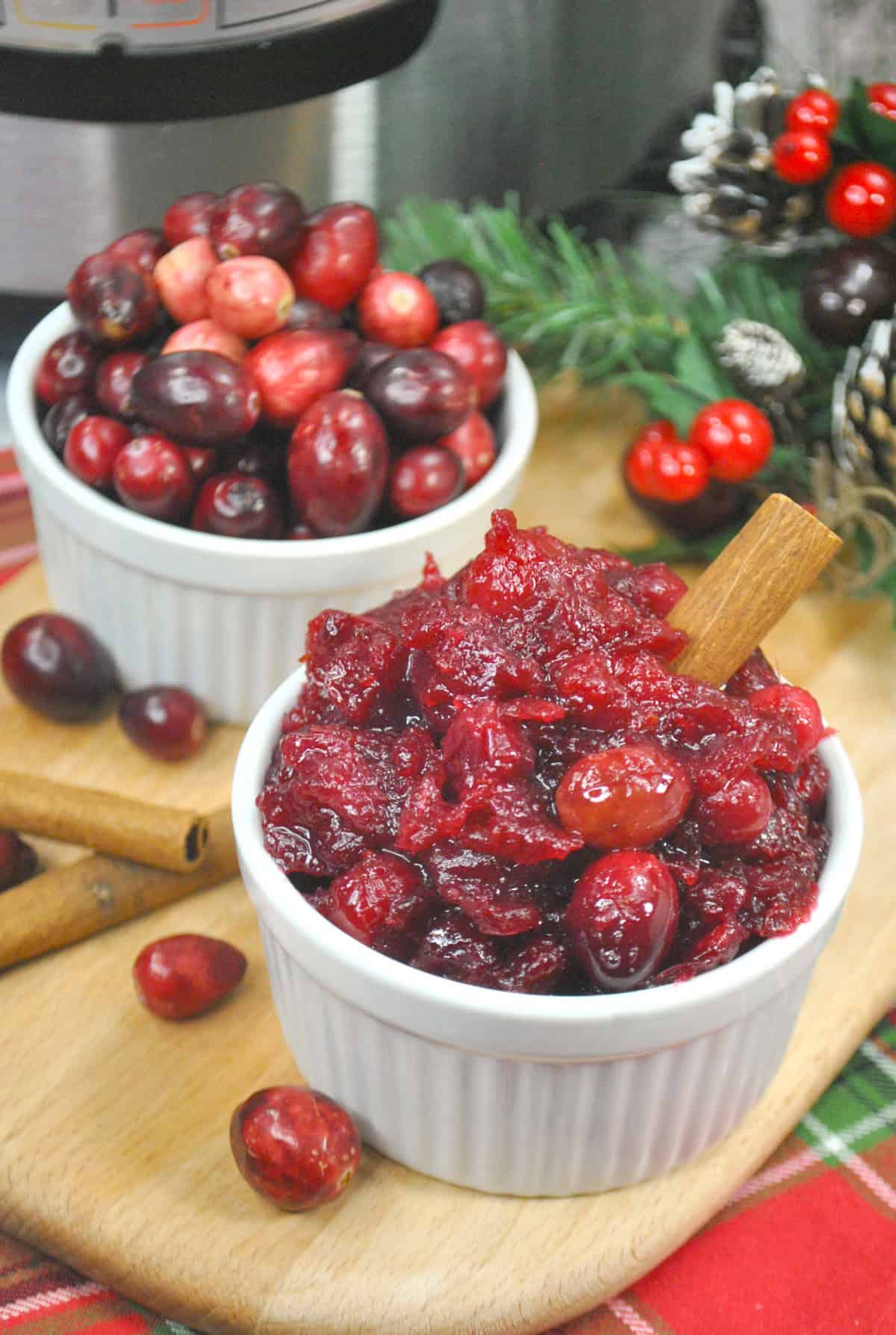 Homemade cranberry sauce in a small white ramekin bowl.