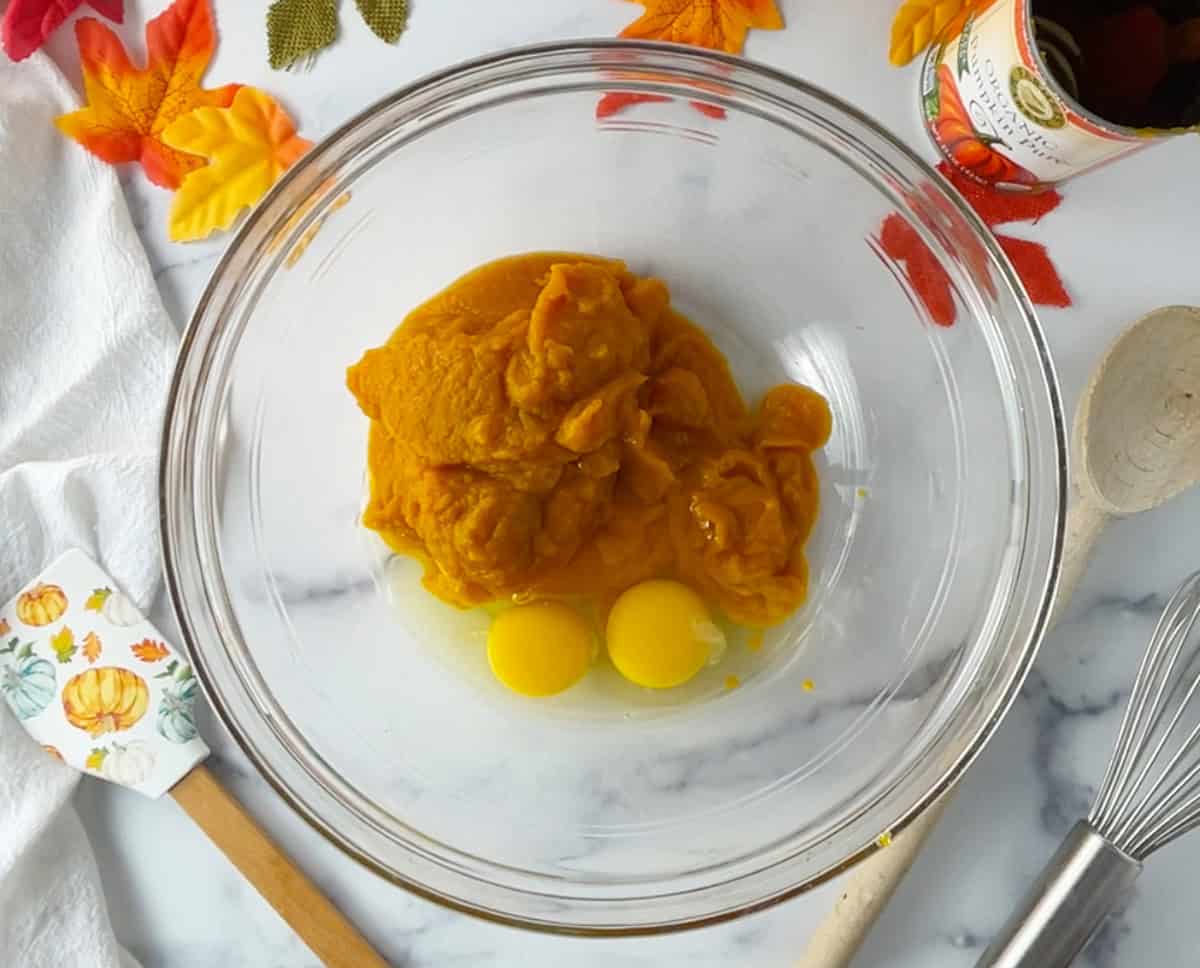 Pumpkin and eggs in a bowl.