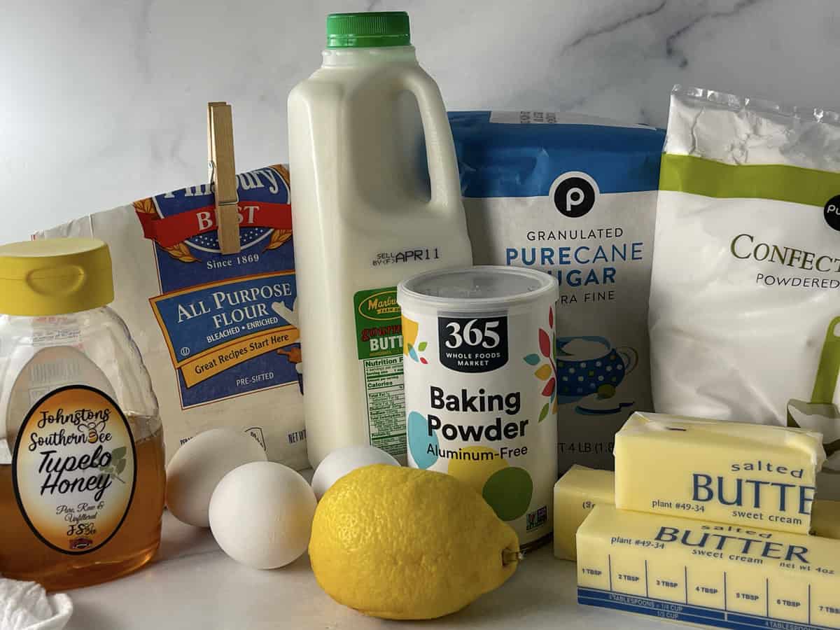 All the ingredients you need to make lemon bundt cake sitting on the counter.