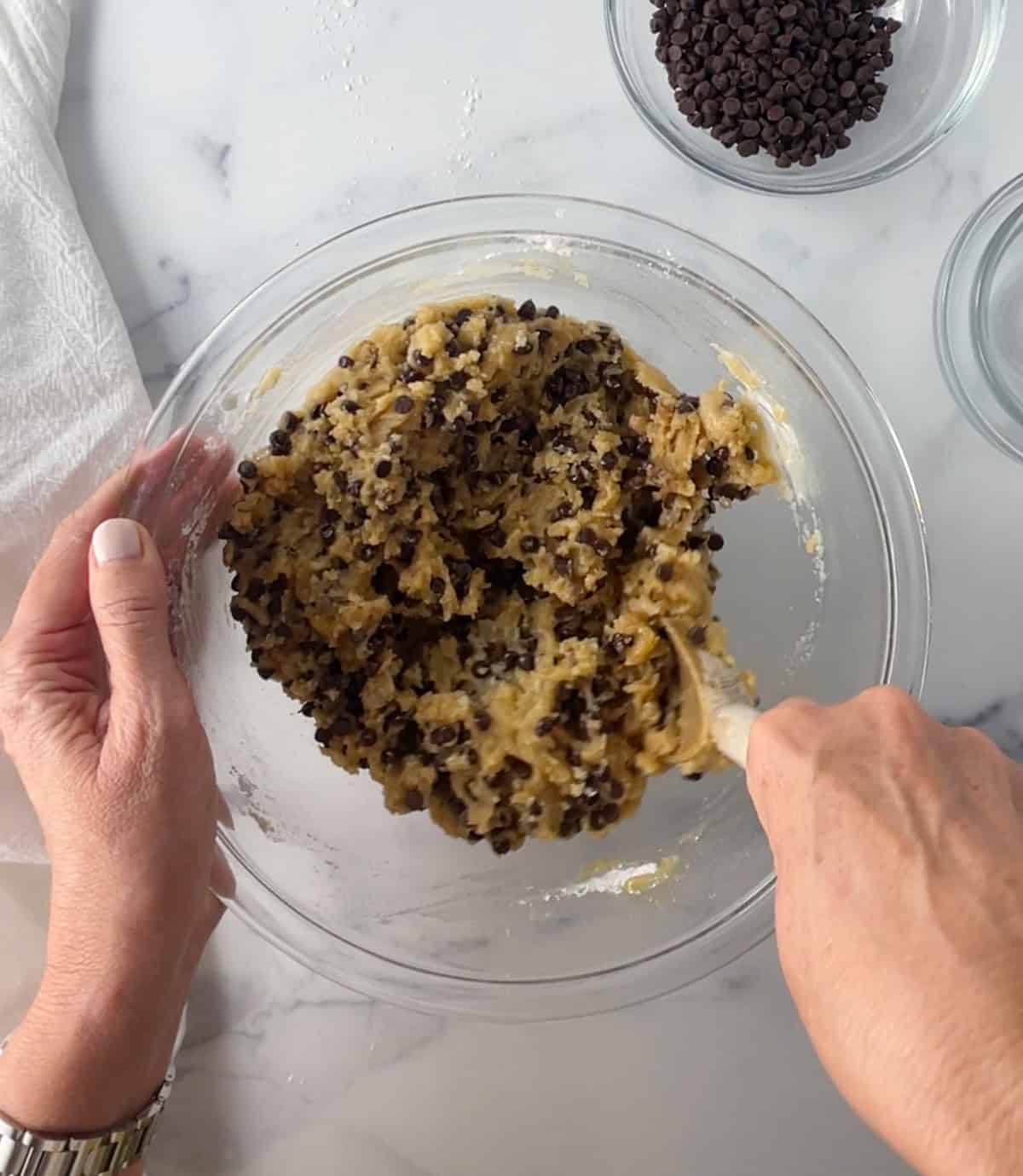Mixing homemade cookie dough in a bowl.