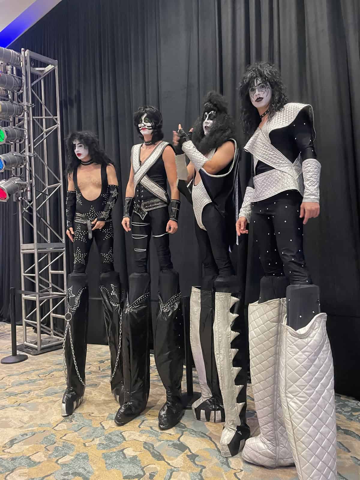 Kiss band look alikes at the happy hour at music through the decades event.
