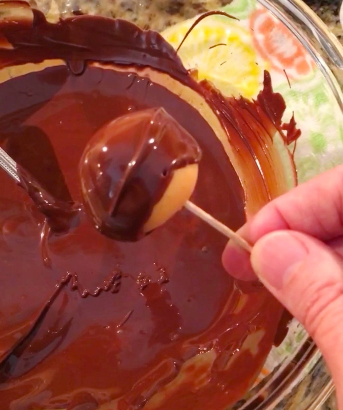 Step-by-step image of rolling peanut butter buckeyes before dipping in chocolate.