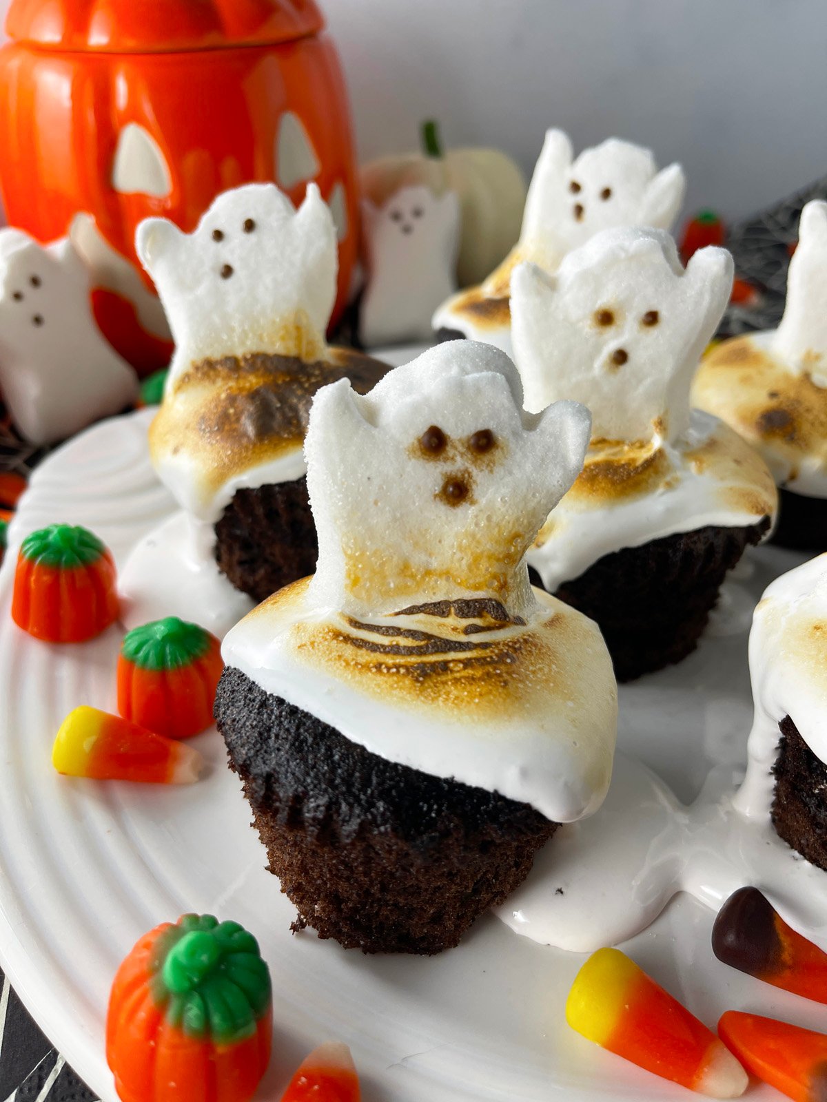 Easy Halloween ghost peep cupcakes on a plate.