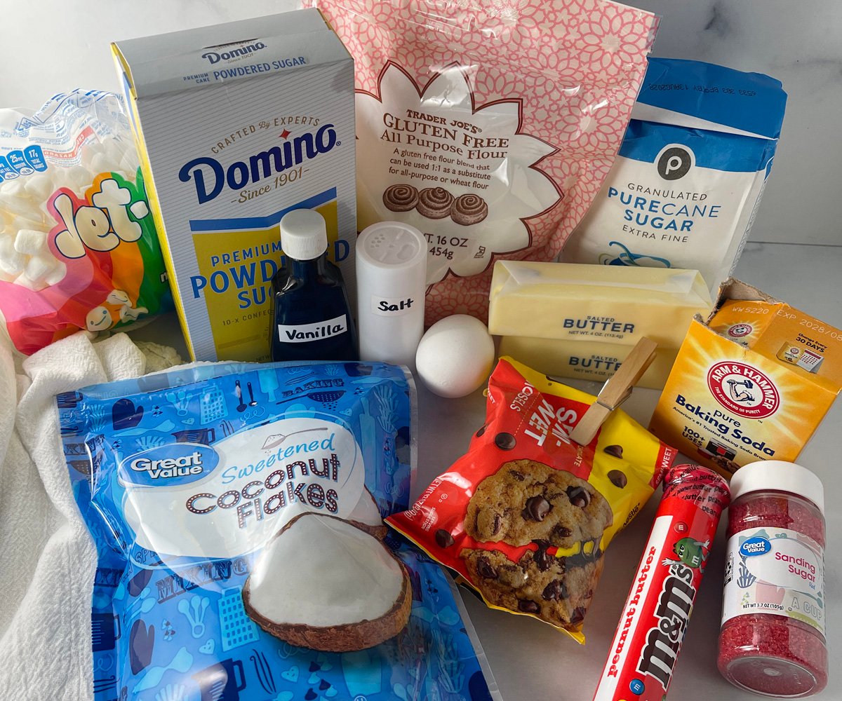 Ingredients needed for gluten-free Santa sugar cookies arranged on a countertop.