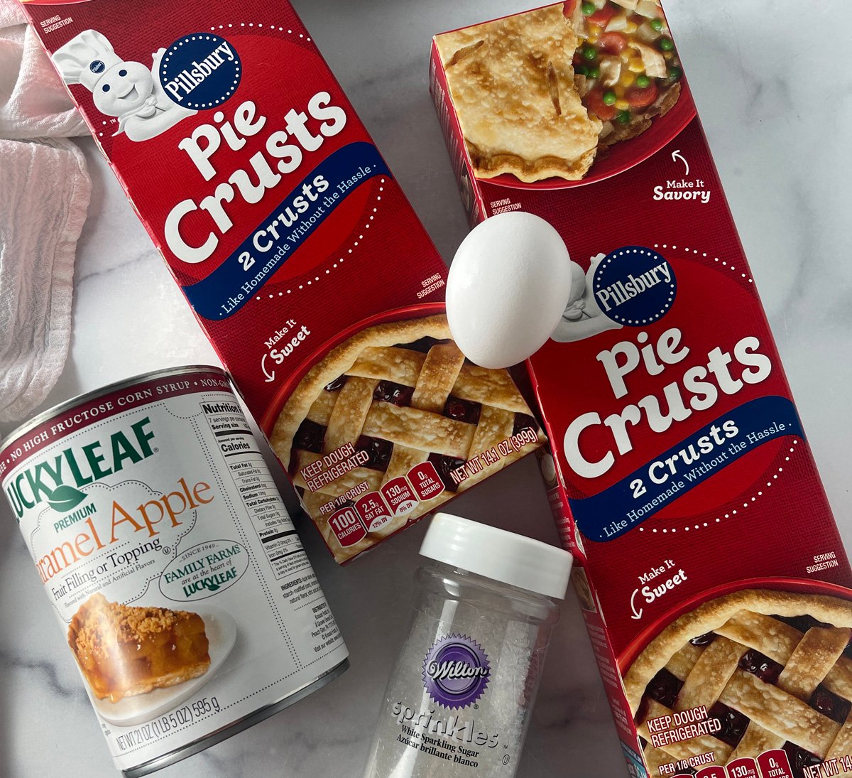 Ingredients needed for mini caramel apple pies.