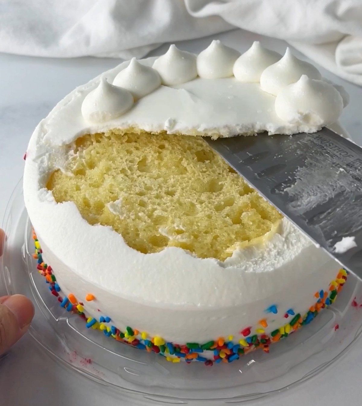 Walmart cake with white frosting.