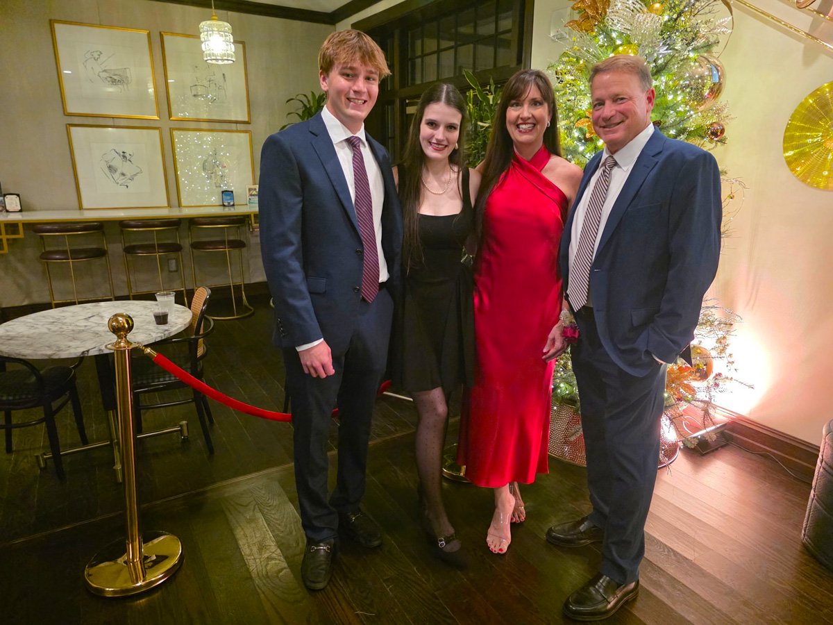 Family photo by the Christmas tree.