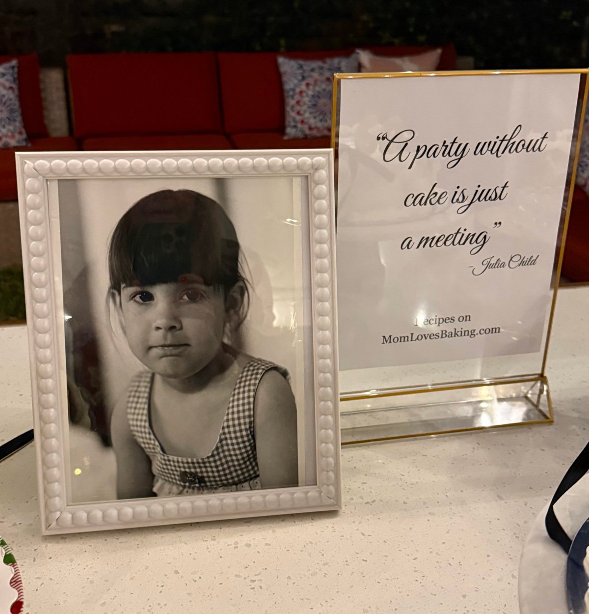 Black and white photo of a very young Mom Loves Baking, age 5.