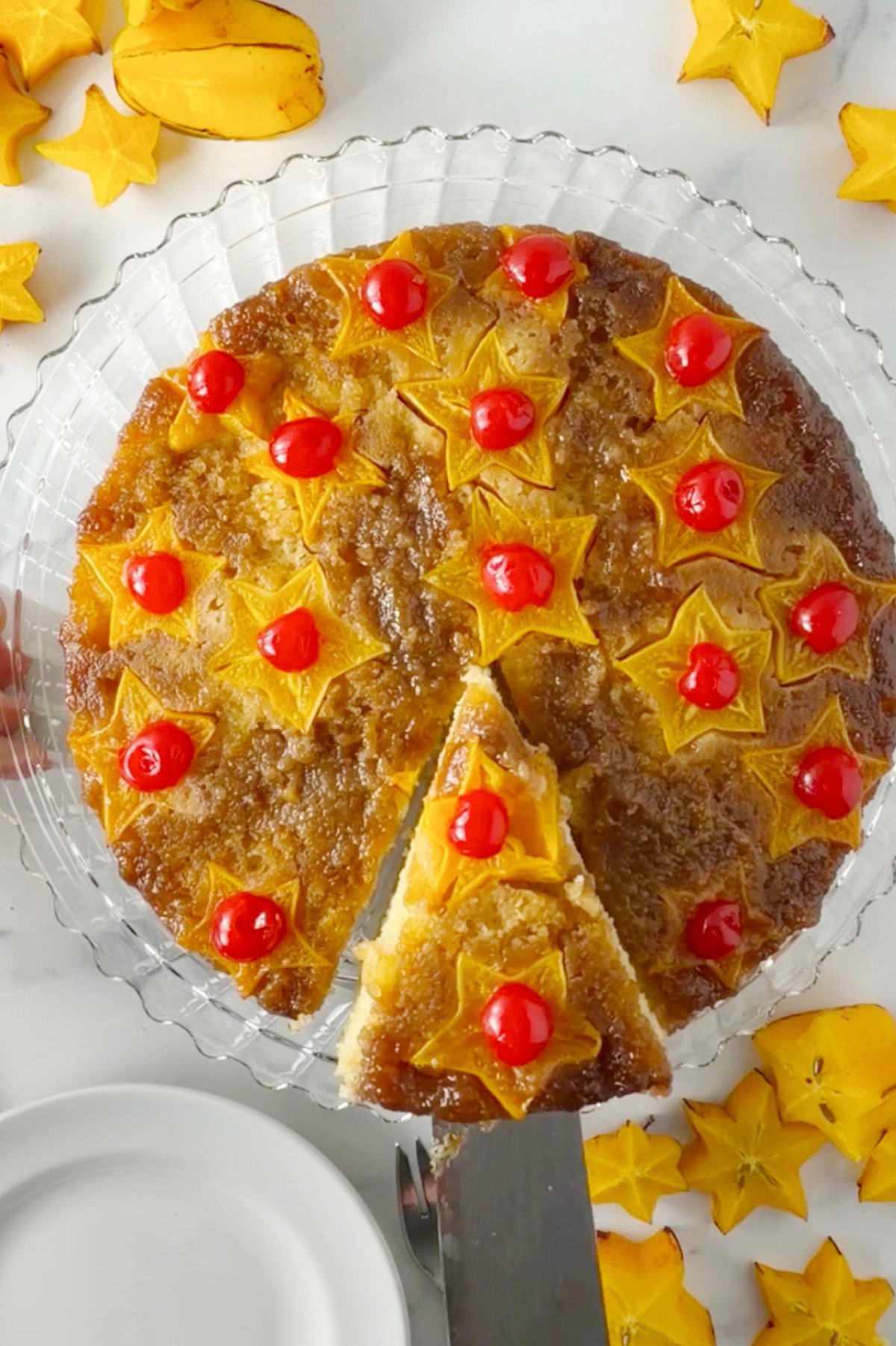 Serving star fruit upside cake.
