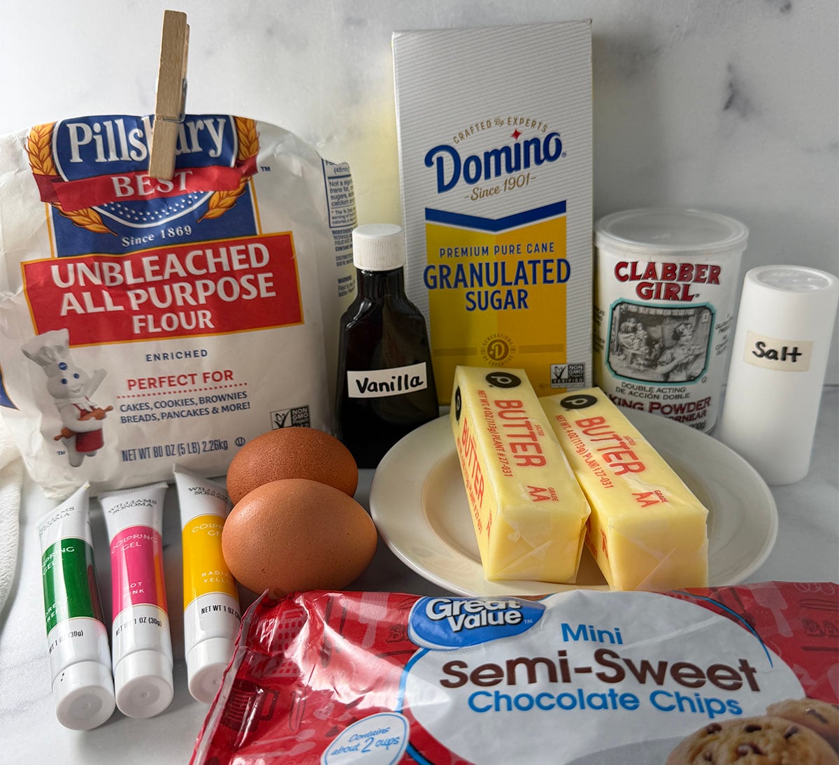 Ingredients on counter needed to make watermelon sugar cookies.