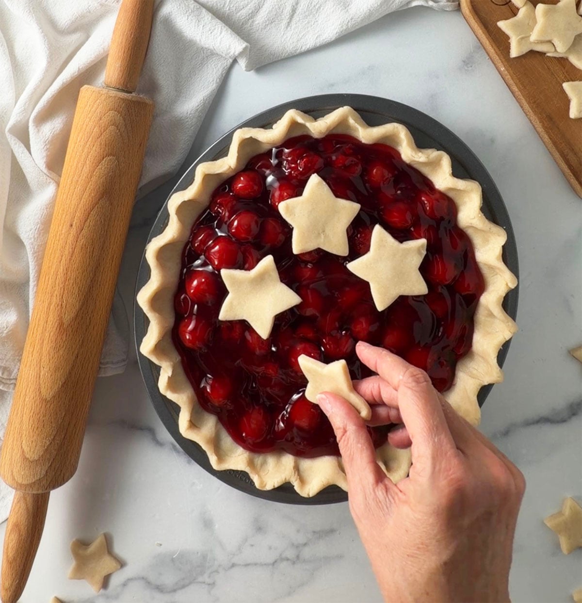 Easy cherry pie with homemade pie crust stars.