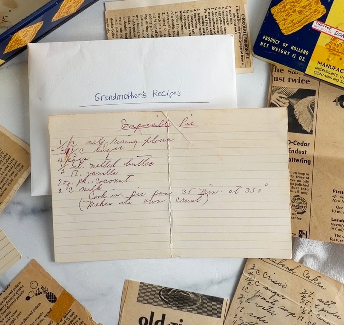Vintage recipe card with old fashioned cursive handwriting of Impossible Pie.