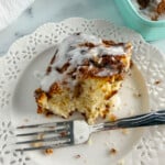 Slice of cinnamon flop cake on plate.