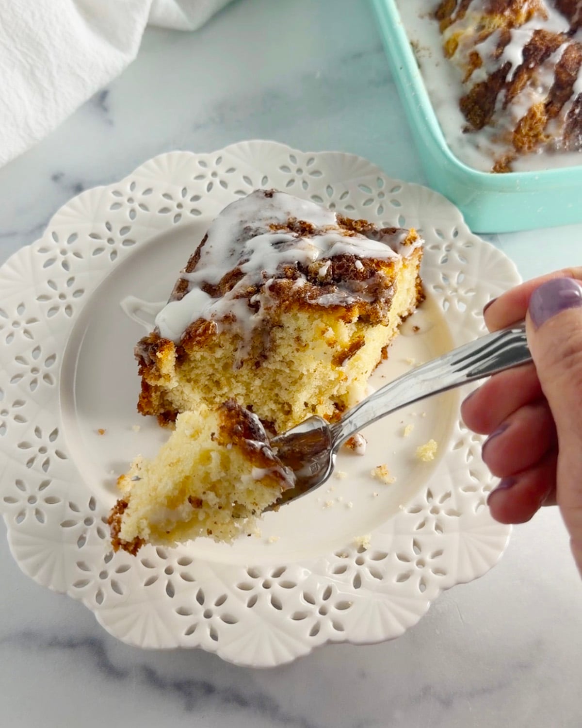 Piece of coffee cake on plate.
