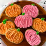 Brown sugar pumpkin cutout cookies on plate.