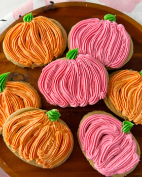 Brown sugar pumpkin cutout cookies on plate.