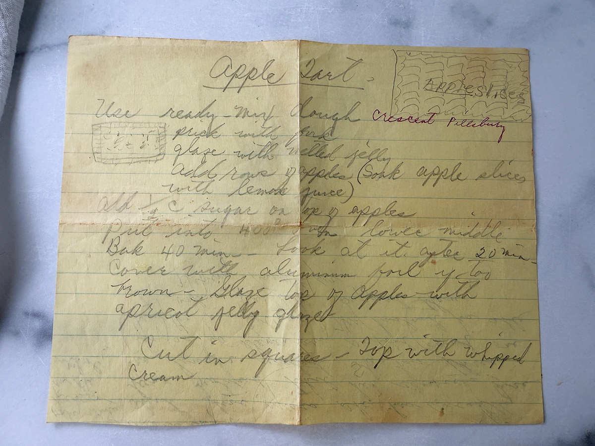 My grandmother's handwritten recipe for apple tart with crescent dough.